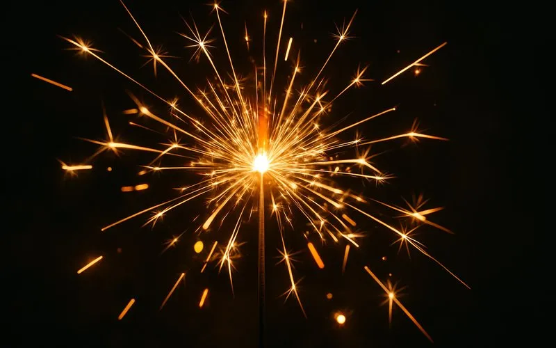 Sparkler: Small firework producing bright sparks
